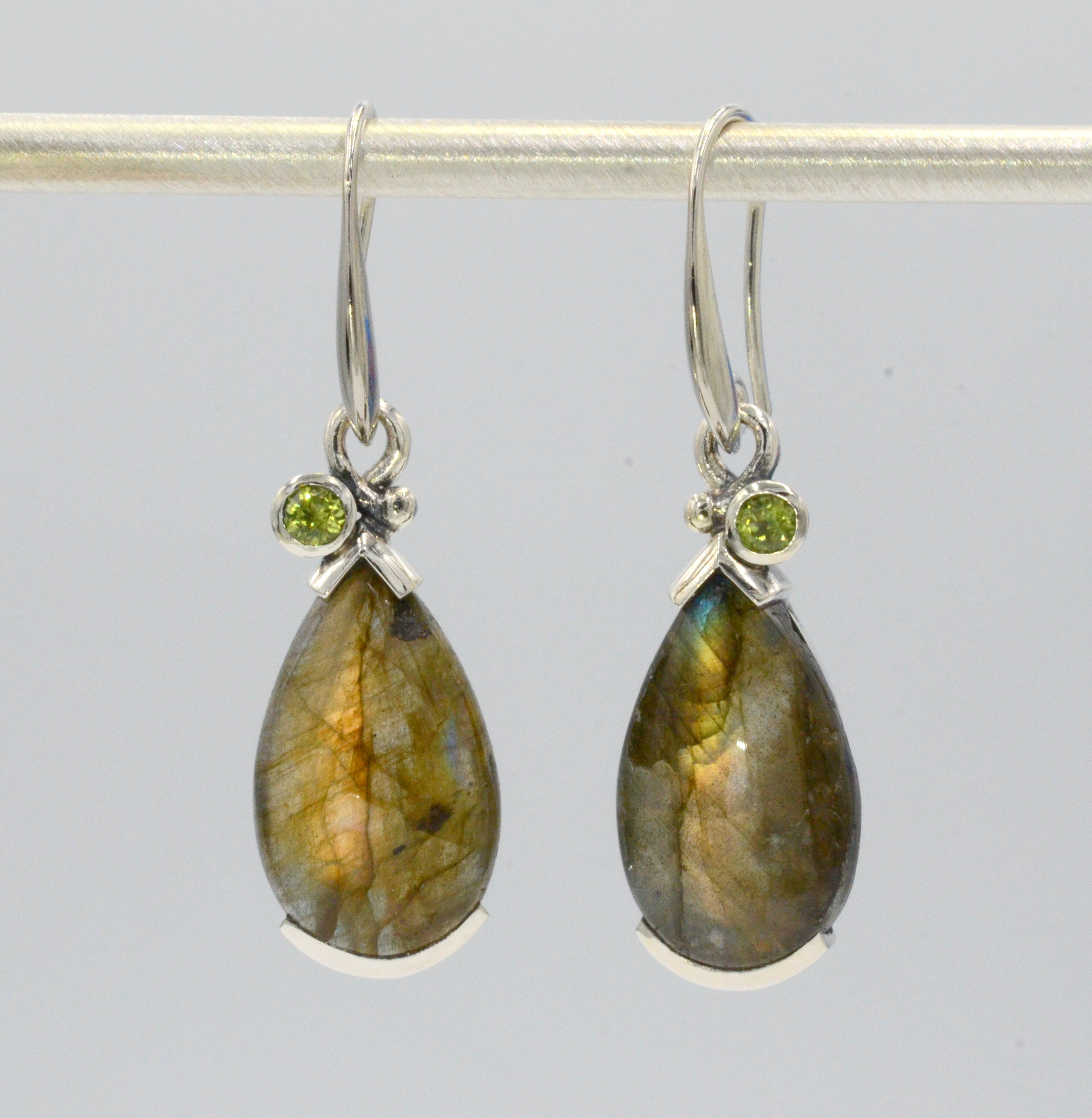 Beautiful multi color Labradorites and Peridot Euro Charms. Earrings come with Sterling Silver French wires and can also be worn with our Euro Wires. Go to "About Store" for more information in regard to our Euro Wires.